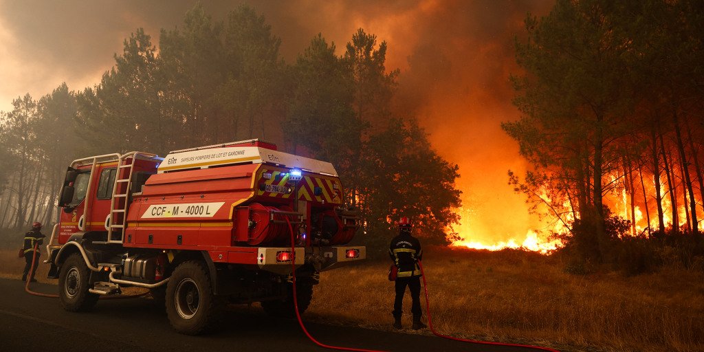 Macron visits wildfire battleground in France, pledges to support fire crews