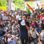 Police clash with supporters of India's Cockroach movement during protest march in New Delhi