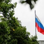 Russian journalist sentenced to 12 years for treason in closed trial