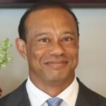 Tiger Woods congratulates Tom Kim after his victory at the Scottish Open