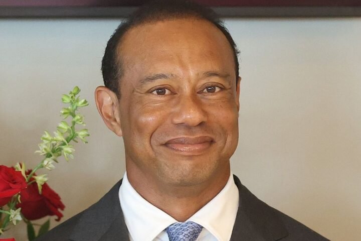 Tiger Woods congratulates Tom Kim after his victory at the Scottish Open