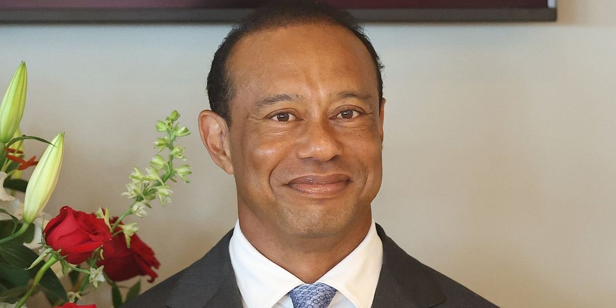 Tiger Woods congratulates Tom Kim after his victory at the Scottish Open