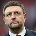 Arsenal's Richard Garlick urges prompt resolution of Manchester City's financial charges