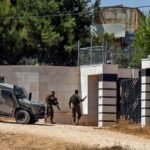 Escalating standoff in West Bank as settlers surround Palestinian families