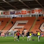 Jordon Brown taken to hospital following chest infection during Blackpool's season opener