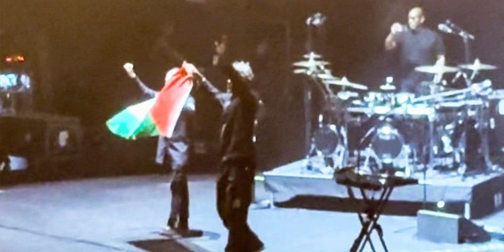 Massive Attack members detained in Singapore for displaying Palestinian flag at concert