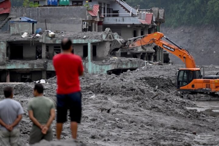 Nepal flood death toll rises to 903 amid struggles to reach missing individuals