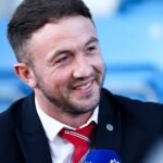 Rugby league player released after refusing to shake hands with team bus driver