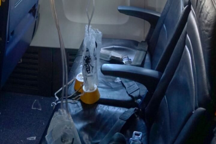 Ryanair flight window shattered by engine part, man nearly sucked out during incident