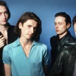 Suede reflects on their evolution in new biography after 20 years of transformation