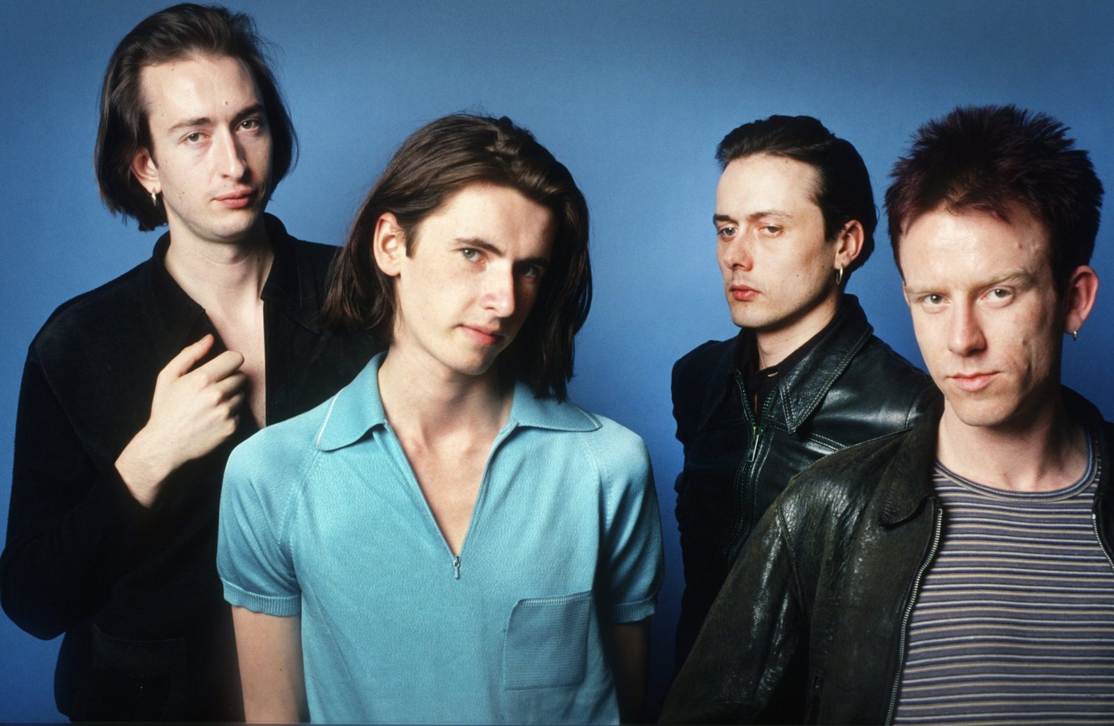 Suede reflects on their evolution in new biography after 20 years of transformation
