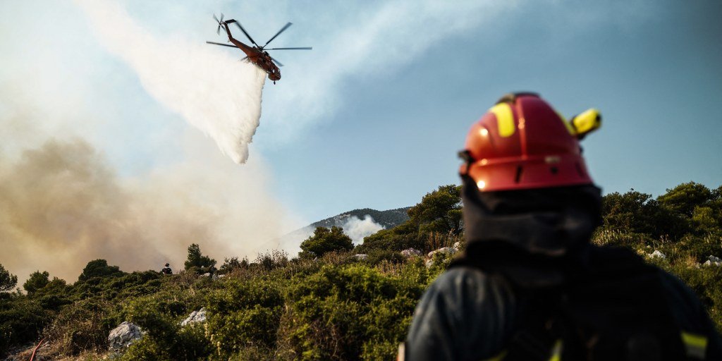 Two firefighting helicopters collide above Athens amid ongoing wildfire crisis in Greece