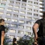 Woman leaps from burning Berlin high-rise to safety in dramatic rescue