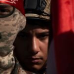 Iran signals new military threats as Trump considers meeting with Iranian president