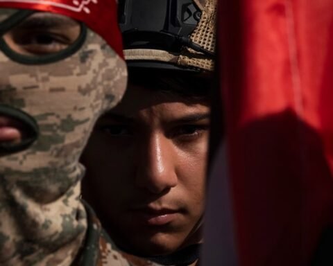 Iran signals new military threats as Trump considers meeting with Iranian president