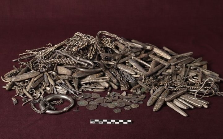 Large Viking Age silver hoard discovered in Danish garden during renovation work