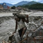 Nepal's prime minister calls for global action on climate change following devastating floods