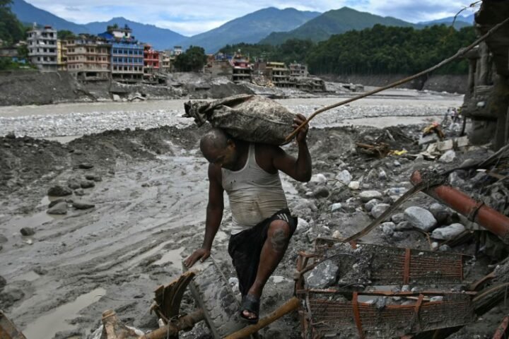 Nepal's prime minister calls for global action on climate change following devastating floods