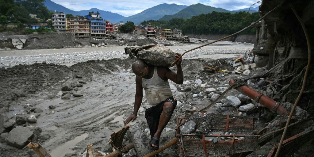 Nepal's prime minister calls for global action on climate change following devastating floods