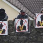 Protests erupt as Orange Order march proceeds after nearly three decades of bans