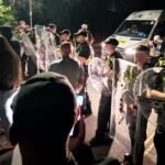 U.K. government denounces anti-migrant protests as disruptive and thuggish