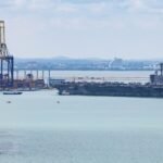 USS Abraham Lincoln docks in Thailand after lengthy deployment in the Middle East