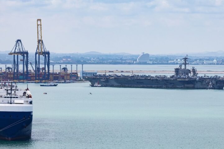 USS Abraham Lincoln docks in Thailand after lengthy deployment in the Middle East