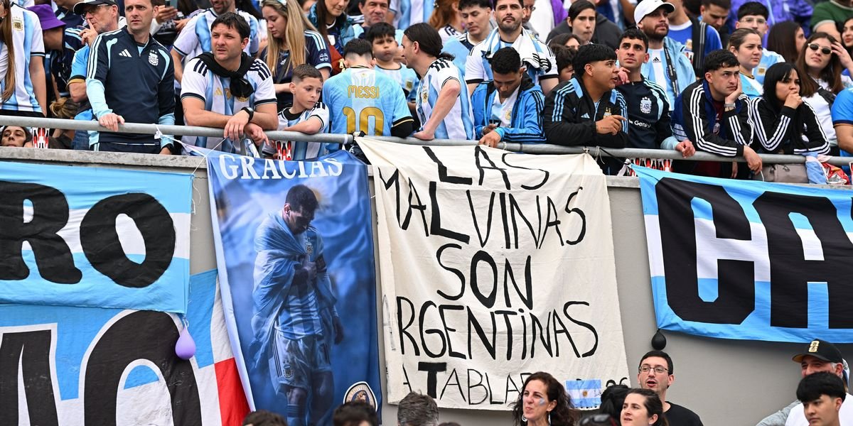 Argentina fans display banners claiming Falkland Islands ownership during Messi's farewell match