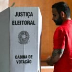 Brazilians cast votes in divisive election as Lula challenges Flavio Bolsonaro for power