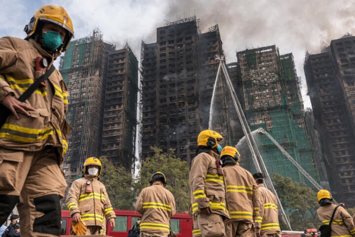 Hong Kong leader apologizes for deadly fire amid criticism of construction practices