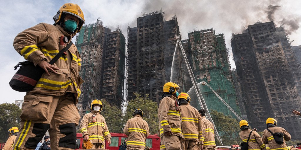 Hong Kong leader apologizes for deadly fire amid criticism of construction practices