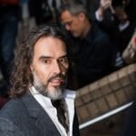 Russell Brand appears in London court for trial on rape and sexual assault charges