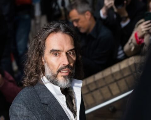 Russell Brand appears in London court for trial on rape and sexual assault charges