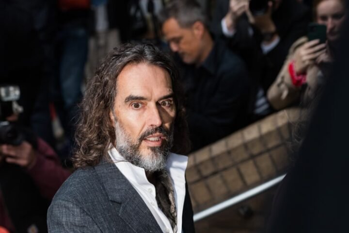 Russell Brand appears in London court for trial on rape and sexual assault charges
